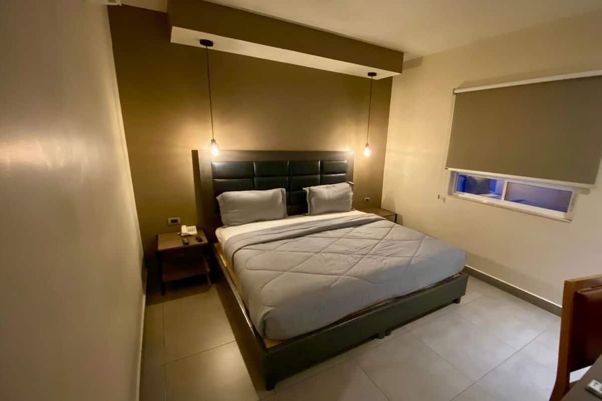 Deluxe Suite | 2 bedrooms, down comforters, desk, laptop workspace