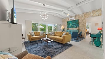 Luxury Villa | Living area | 60-inch Smart TV with cable channels