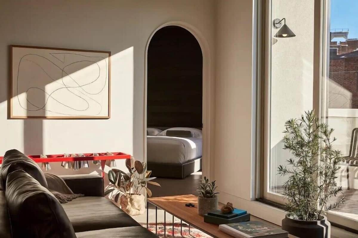 Suite Deluxe, 2 chambres, en angle | Coin séjour