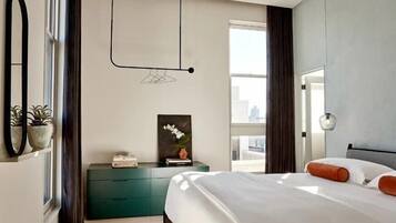 Suite Deluxe, 2 chambres, cuisine, dans la tour | 2 chambres, rideaux dâobscurcissement, fer et planche Ă repasser