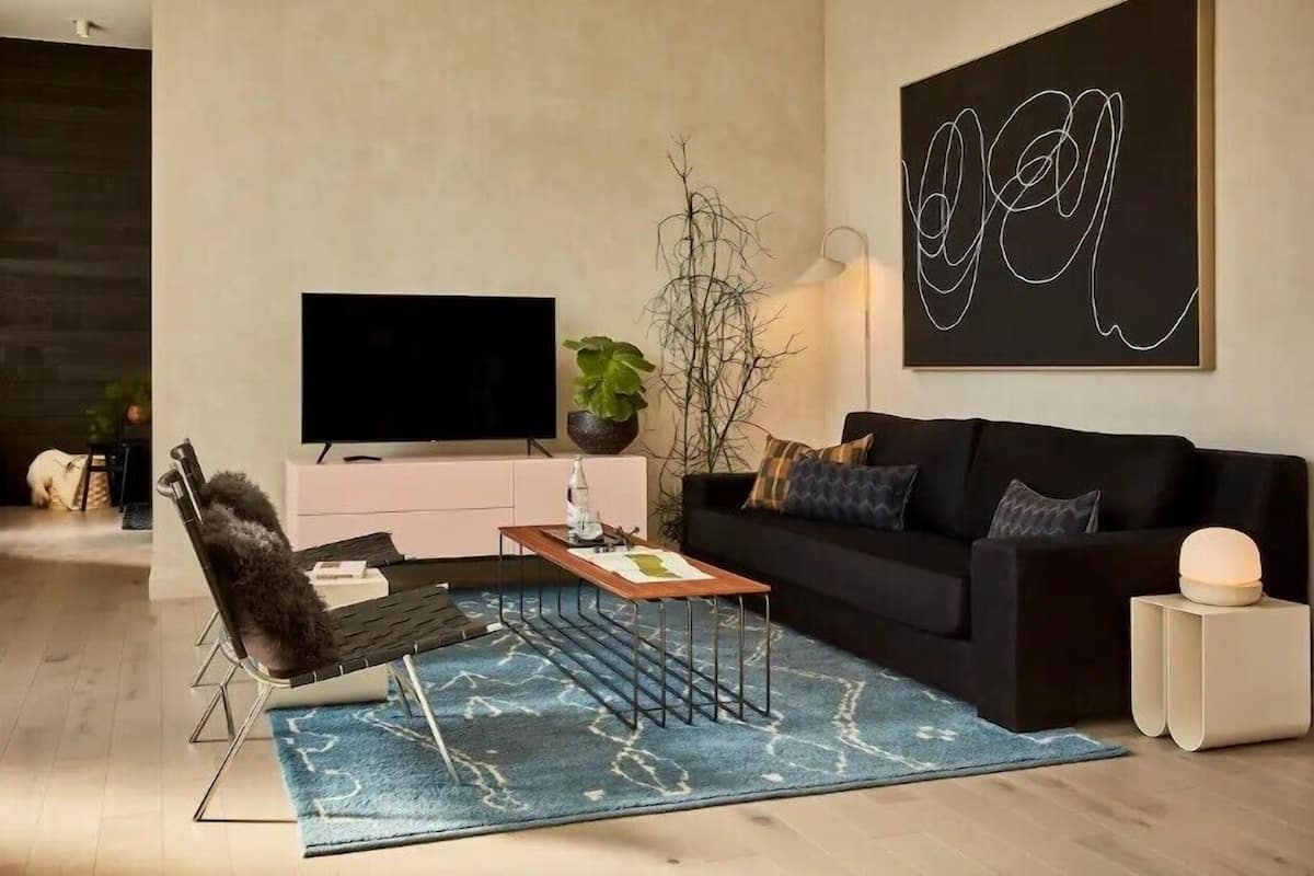 Suite Deluxe, 1 trÚs grand lit, cuisine, rez-de-chaussée | Coin séjour