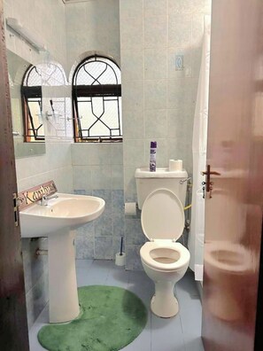 Shower, bidet, towels, soap - 1 BDR Apt @ The Magnolia Along RiverSide Drive / Westlands. (Nairobi)