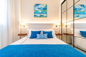 1 dormitorio, tabla de planchar con plancha, wifi