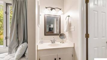 Hair dryer, towels, soap, shampoo