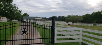 Ranch style Farmhouse located on a horse ranch and rescue south of Fort Worth