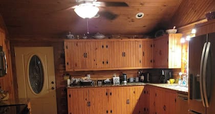 Custom cedar log home in a beautiful setting in the country!!!