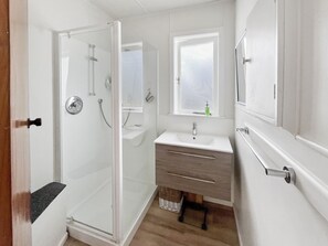 Shower, towels, soap, toilet paper