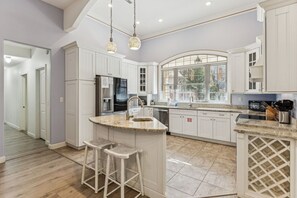 Fridge, microwave, oven, stovetop - Escape to The Estate at Mill Creek: Luxury 5-Bed with Private Pool, Hot Tub, Game Room & Fire Pit (Pigeon Forge)