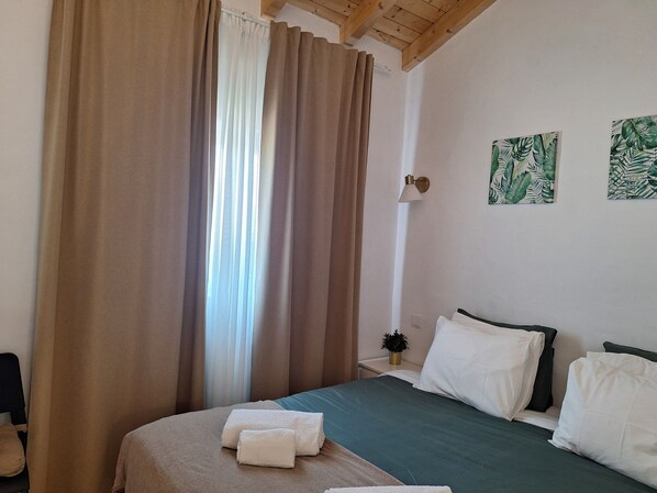 1 chambre, fer et planche à repasser, Wi-Fi gratuit, draps fournis