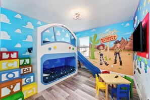 Children’s area - Themed Theater Room | Themed Kids Bedrooms | Games Area | Screened Pool (Kissimmee)
