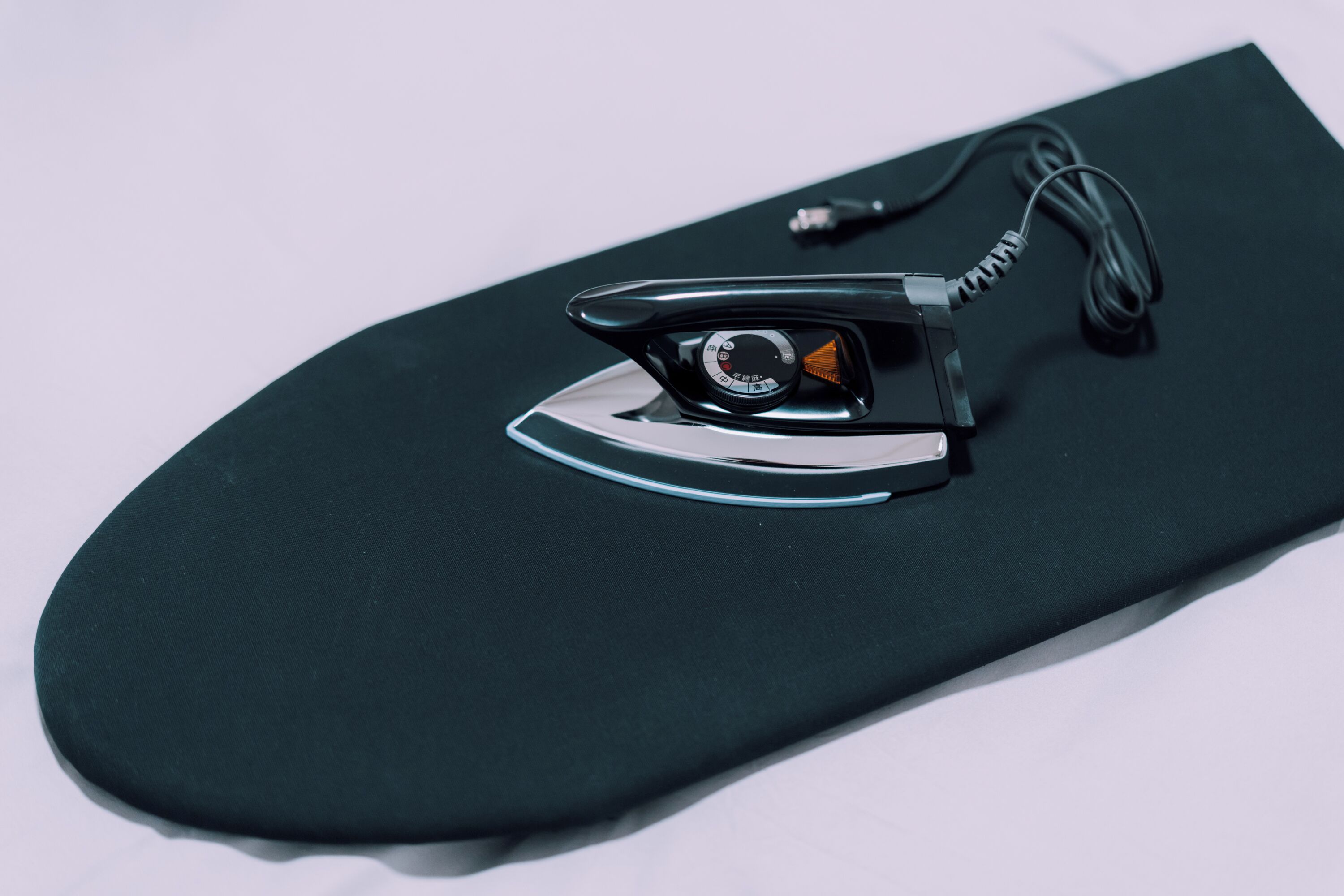 A skateboard with a camera attachment on its underside.
