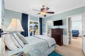 A comfortable, handicap-accessible master suite with ample space and serene channel views. - 3BR Accessible Channel Unit w/ Shared Hot Tub & Waterfront Fire Pit | Walk to Beach (North Myrtle Beach)