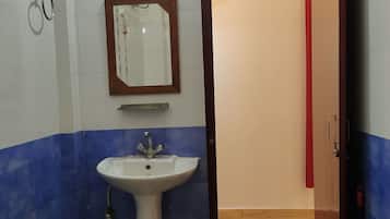 Economy Double Room | Bathroom | Shower, towels, soap