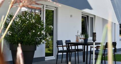 Apartment 'Quartier Wellant' with Terrace, Garden, and View of Weißensberg Chapel