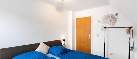 2 dormitorios, tabla de planchar con plancha, wifi gratis y ropa de cama