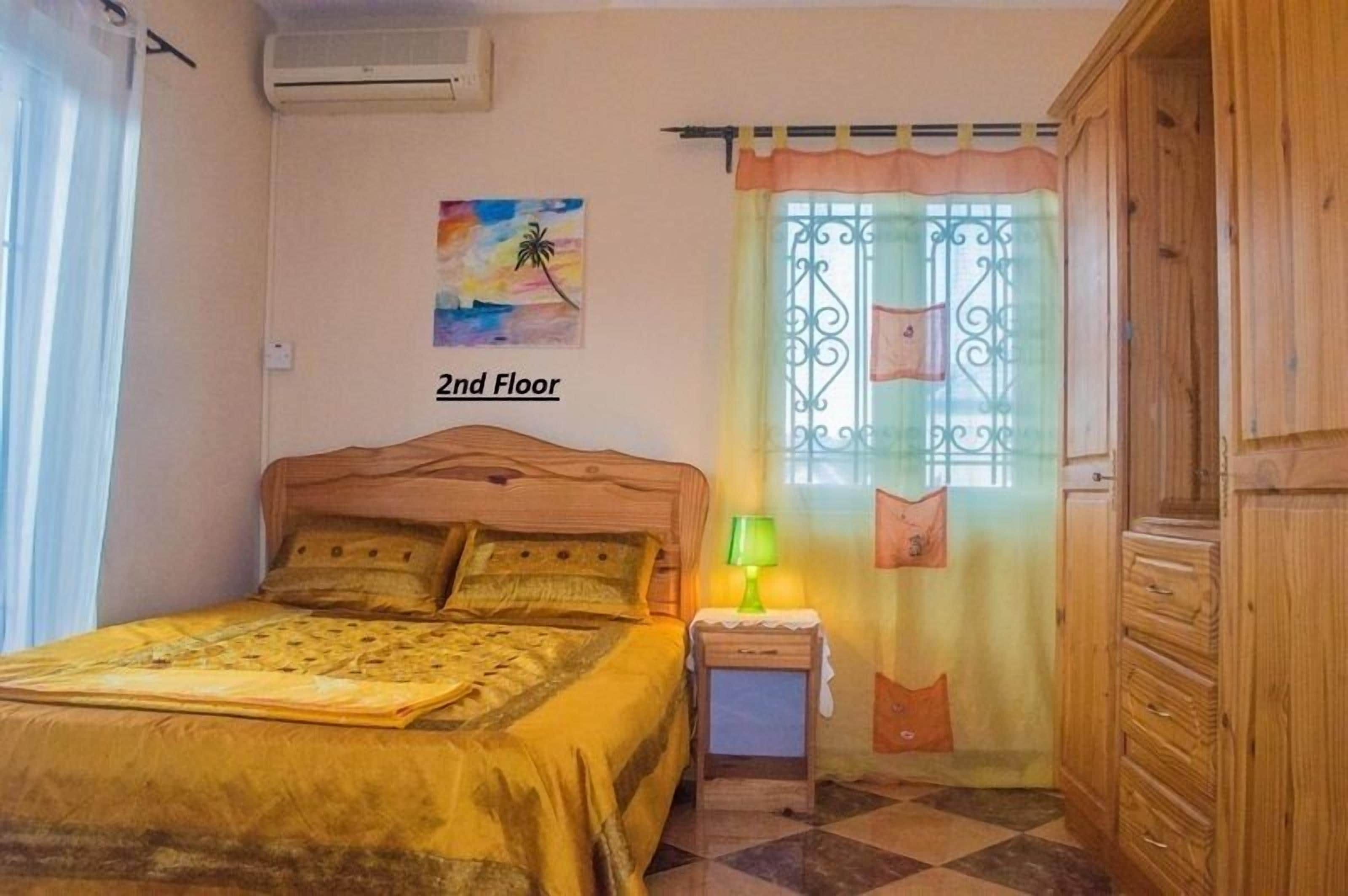 Deluxe villa, balkon, uitzicht op zwembad | Een kluis op de kamer, gratis wifi, beddengoed