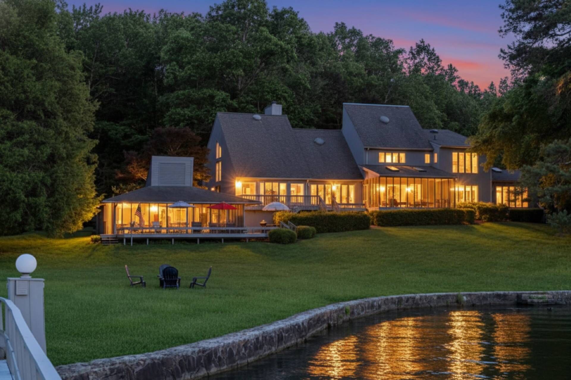 View of the expansive property and yard from the boat dock