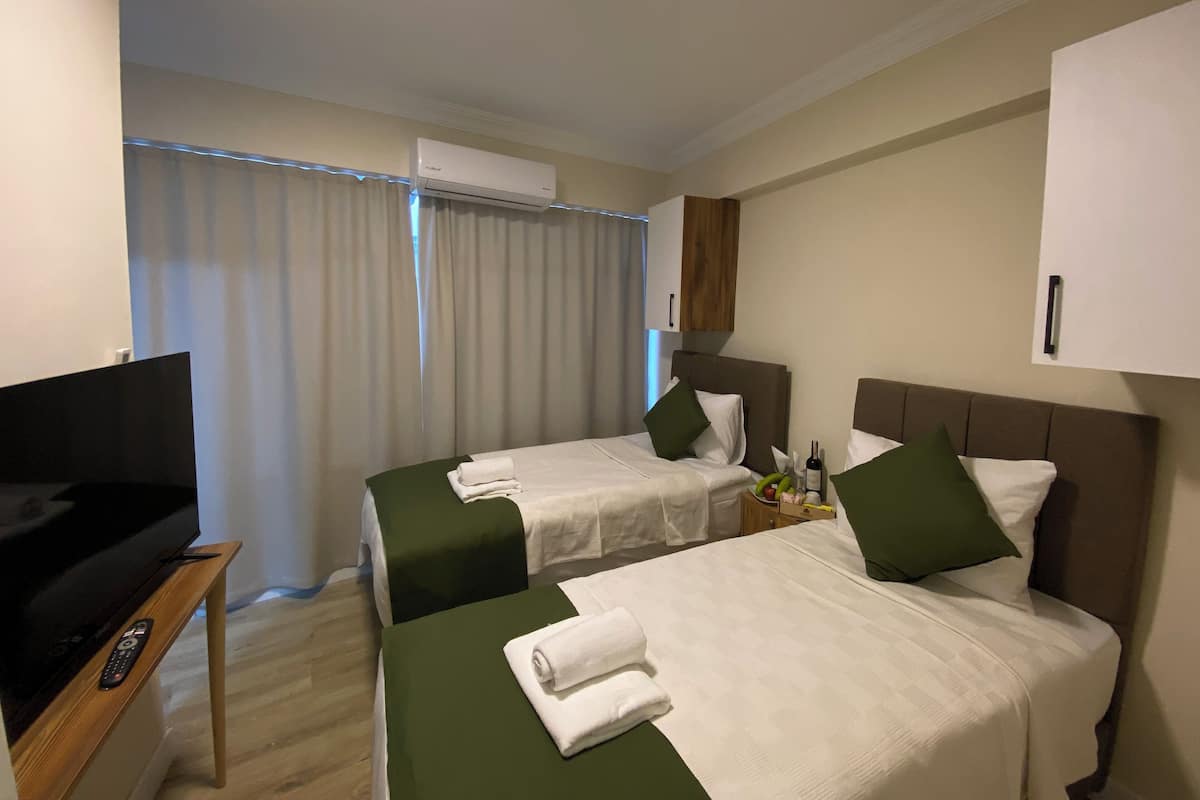 Premium bedding, minibar, desk, laptop workspace