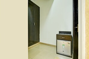 Habitación ejecutiva | Zona de estar | Una televisión