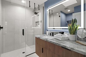 Shower, hair dryer, towels