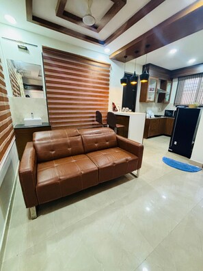 Family Villa | Living area | 32-inch LCD TV with cable channels - ECR Star Villas (Tirupporur)