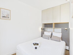 1 chambre, fer et planche à repasser, Wi-Fi, literie fournie