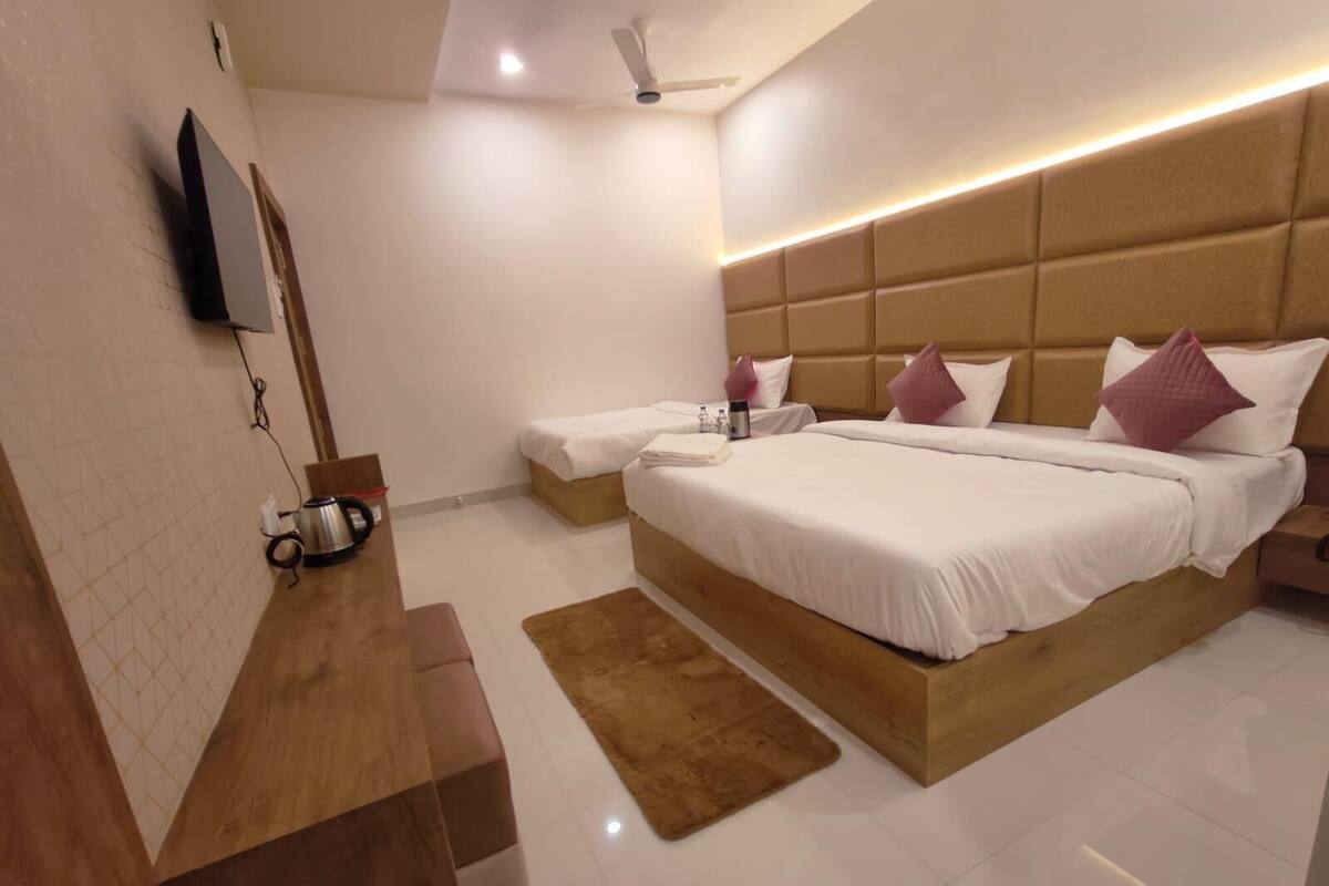 Superior Triple Room, City View | 1 bedroom, premium bedding, pillowtop beds, free WiFi