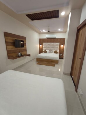 Family Triple Room, City View | Premium bedding, pillowtop beds, free WiFi, bed sheets - Hotel Kashni (Maihar)