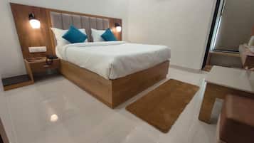 Deluxe Room, City View | Premium bedding, pillow-top beds, free WiFi, bed sheets