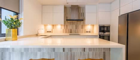 Villa | Private kitchen | Fridge, microwave, oven, stovetop