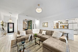 Smart TV, fireplace, books, printers