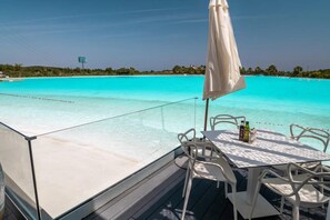 Apartamento | Restaurante al aire libre