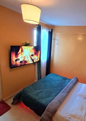 3 slaapkamers, een strijkplank/strijkijzer, wifi, beddengoed