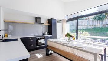 Coffee/tea maker, fridge, microwave, oven