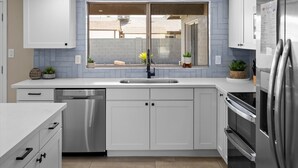 Coffee/tea maker, fridge, microwave, oven
