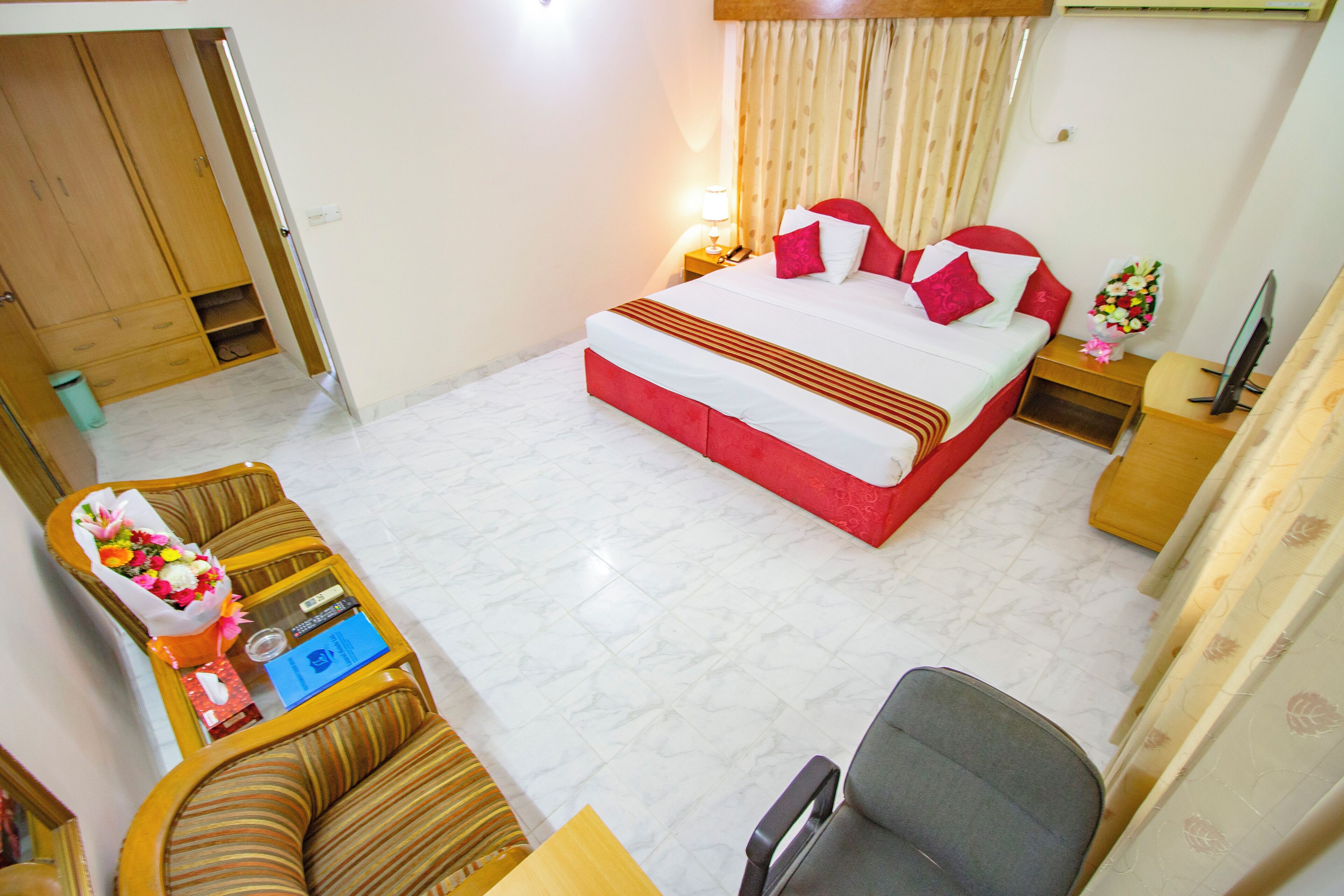 Down comforters, Select Comfort beds, minibar, desk