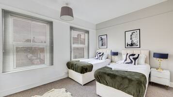 3 bedrooms, desk, iron/ironing board, travel cot