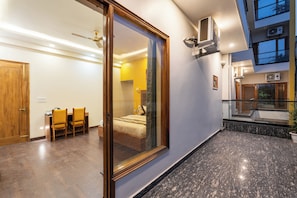 Deluxe Double Room, City View | Terrace/patio