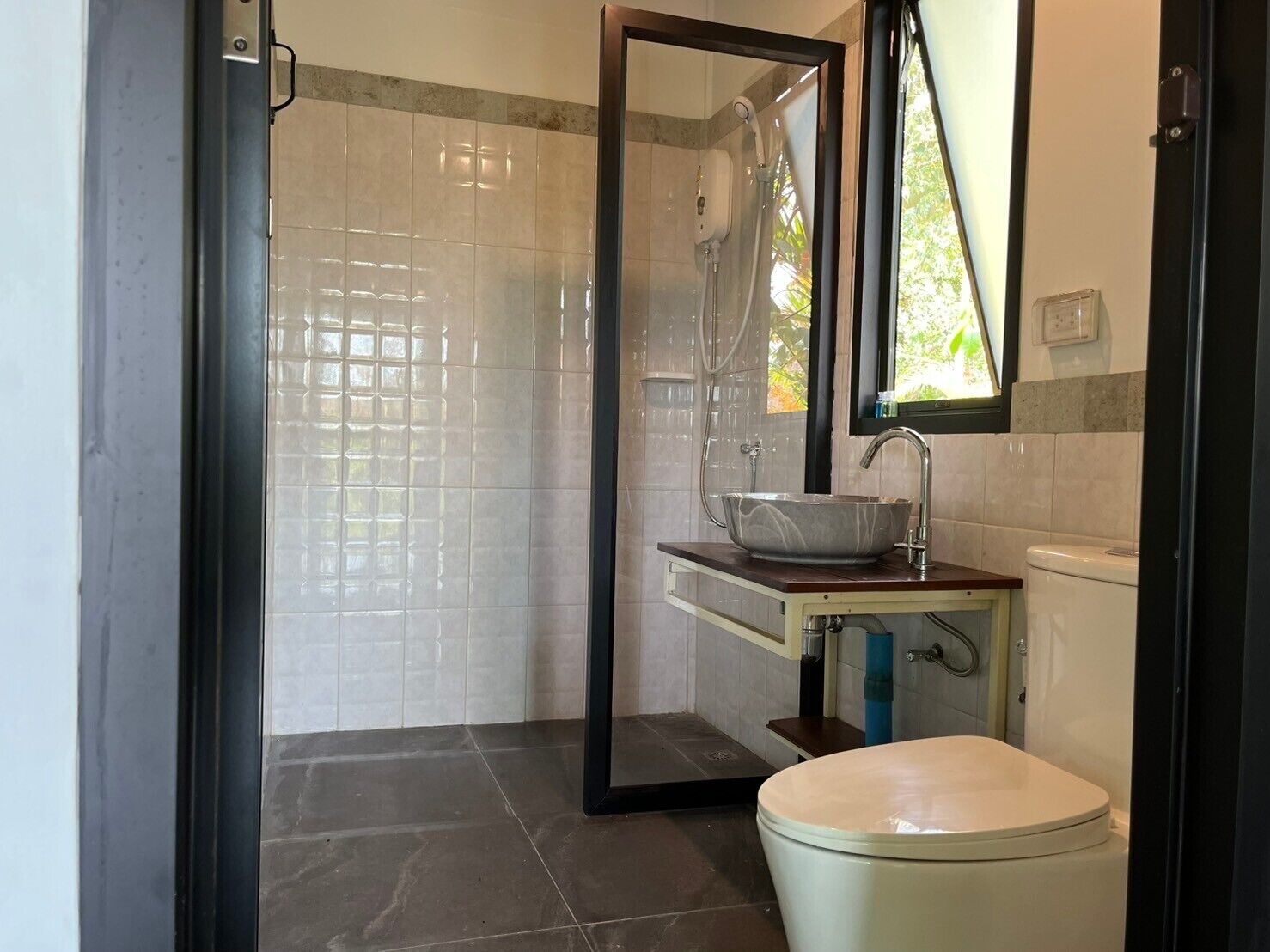 Basic Room, Garden View | Bathroom | Shower, free toiletries, towels, soap