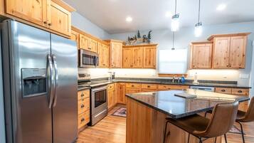 Fridge, coffee/tea maker, cookware/dishes/utensils