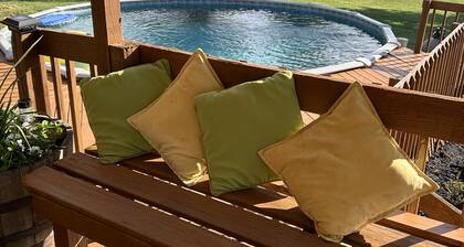 Charming 3-bedroom house ,pool table, fire pit at the Lewis getaway!