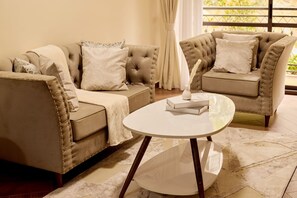 Comfort Apartment, City View | Living area - Sand Grains Residences (Entebbe)