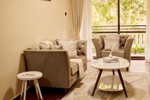 Comfort Apartment, City View | Living area - Sand Grains Residences (Entebbe)