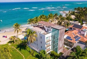 Enjoy panoramic ocean and beach views from the rooftop terrace.