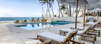Steps from the sand on world-famous Kite Beach – true oceanfront living