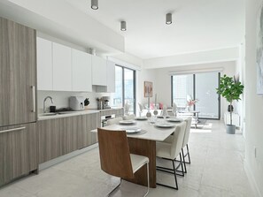 Lägenhet Deluxe - utsikt mot staden | Eget pentry | Kaffe- och tebryggare, brödrost, mixer och pappersservetter