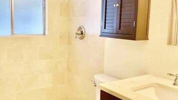 Hair dryer, towels, soap, shampoo