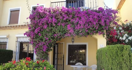 South facing, overlooking the pool.
9 minutes walk to La Zenia beach.
