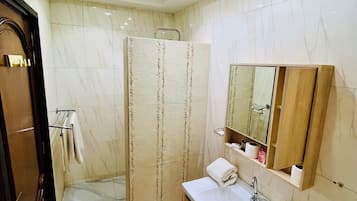 Shower, bidet, towels, soap