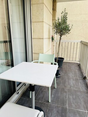 Enjoy a balcony with a table and chairs, perfect for taking in the views.